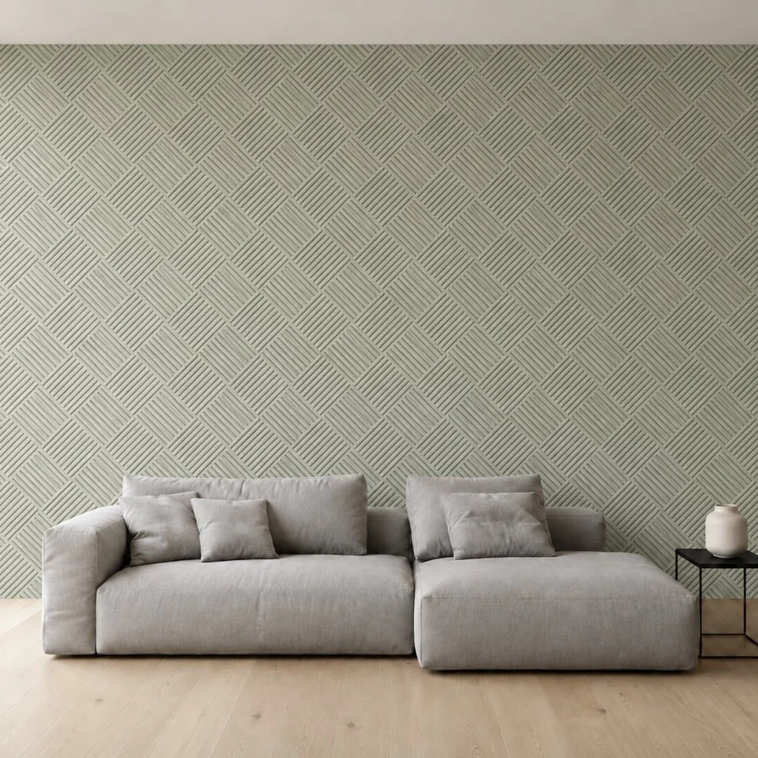 Living room wall in sage embossed wallpaper carrying the pattern